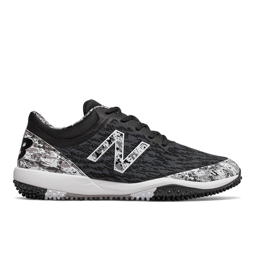 new balance black turf shoes